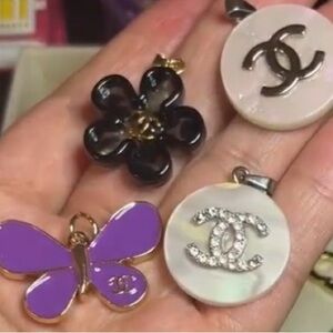 Chanel Black and Purple Charms